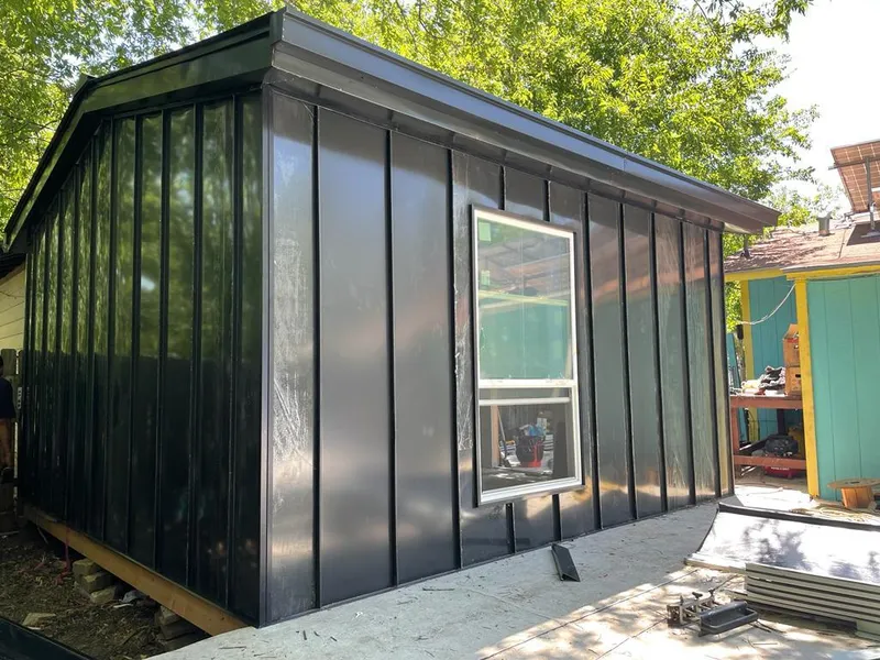 Black standing seam metal wall panels for Roof Inspection in Halfway